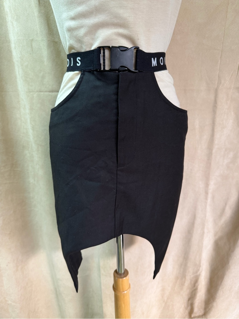 Moi Black Asymmetrical Mini Skirt with Branded Buckle Waist